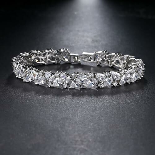 Elegant diamond bracelet on dark surface