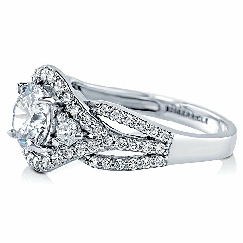 Elegant diamond engagement ring with twisted band design.