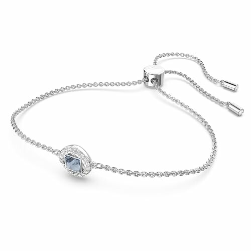 Silver bracelet with a blue gemstone and adjustable clasp