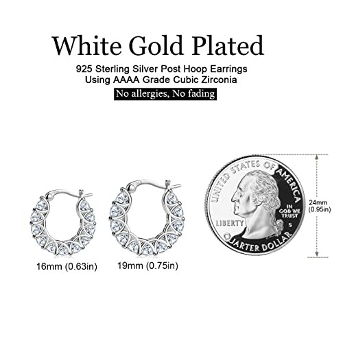 White gold plated hoop earrings with cubic zirconia next to a quarter for size reference.